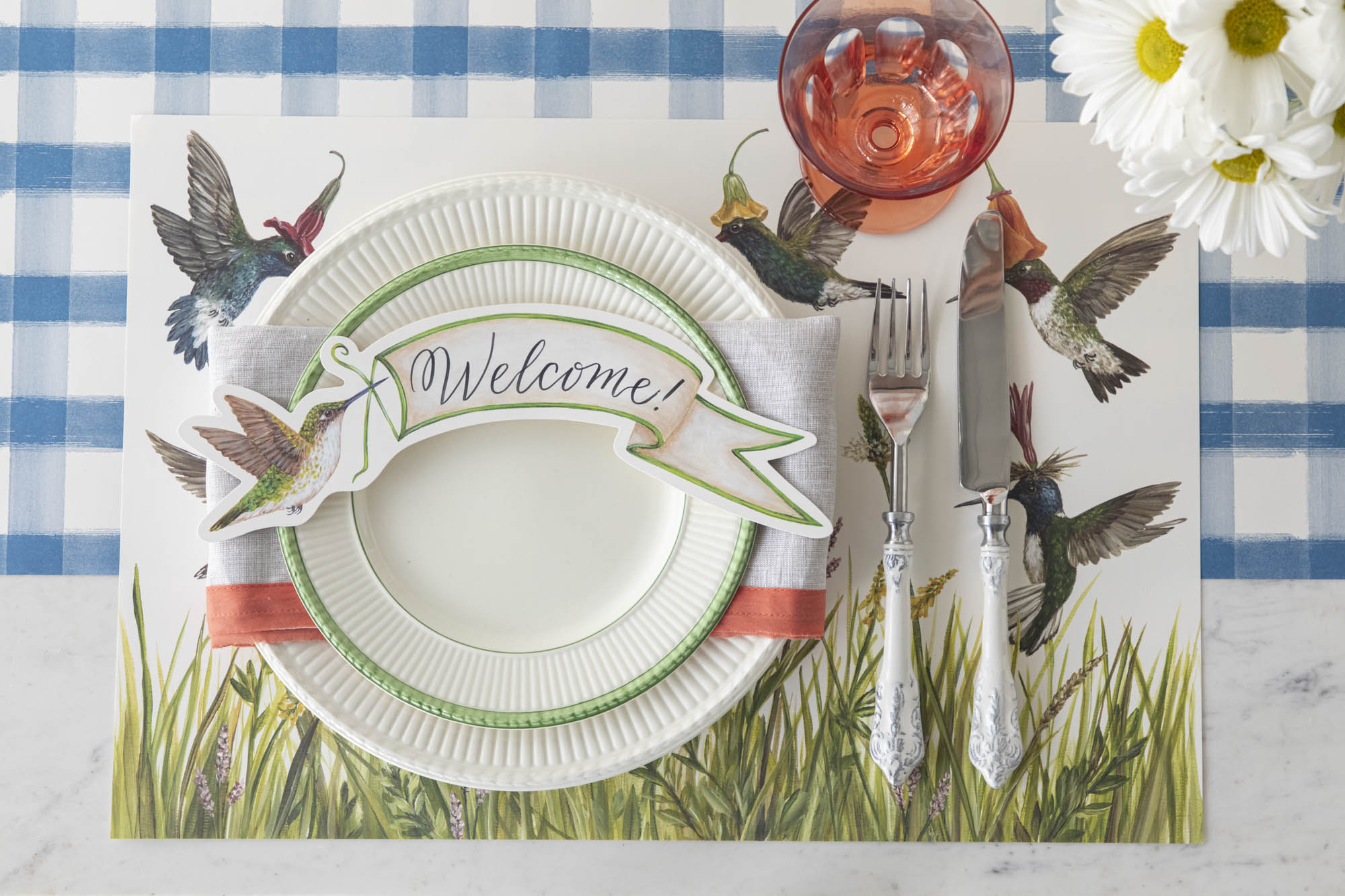 A garden party themed place setting featuring the Die-cut Songbird Wreath Placemat.