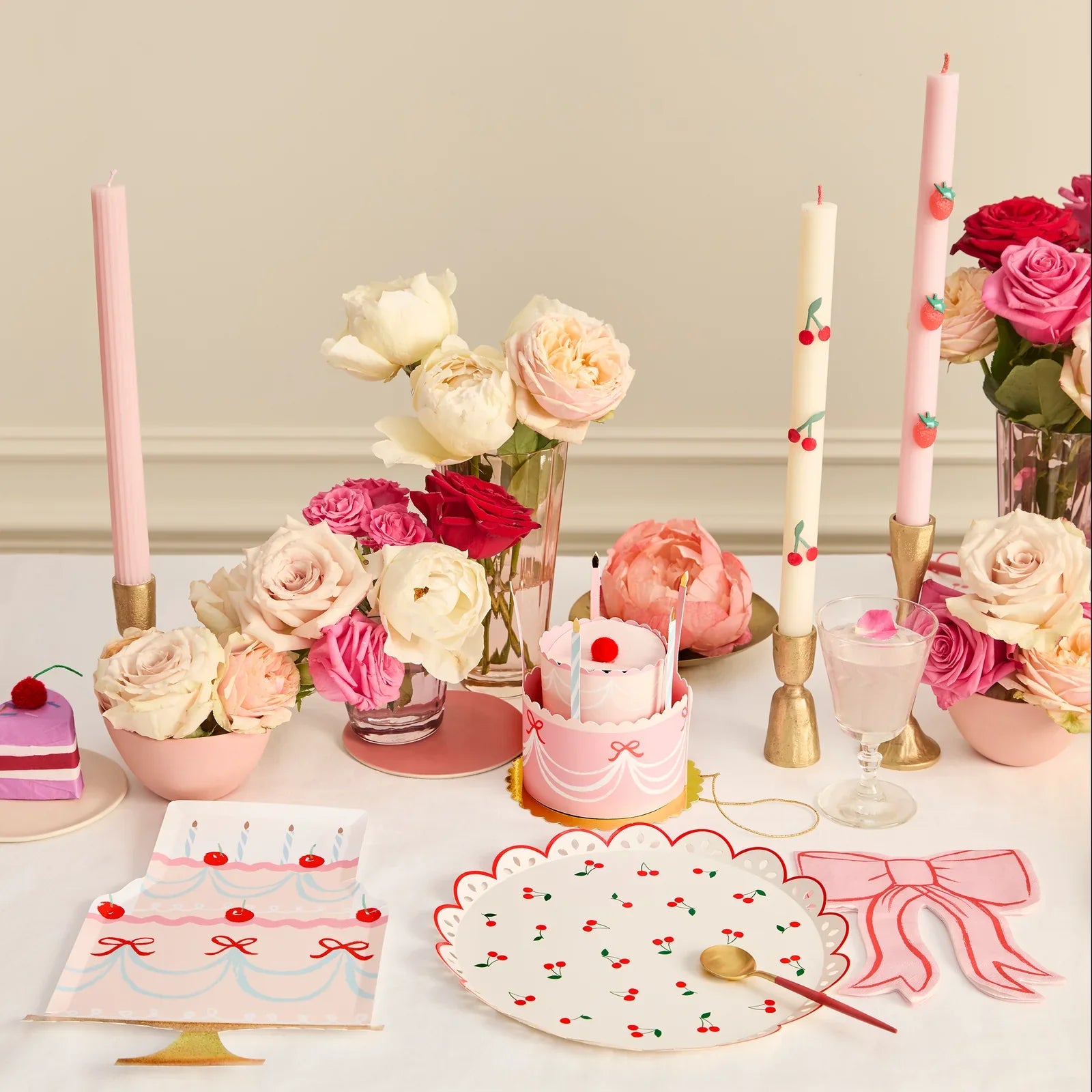 Meri Meri cherries and bow themed table setting.