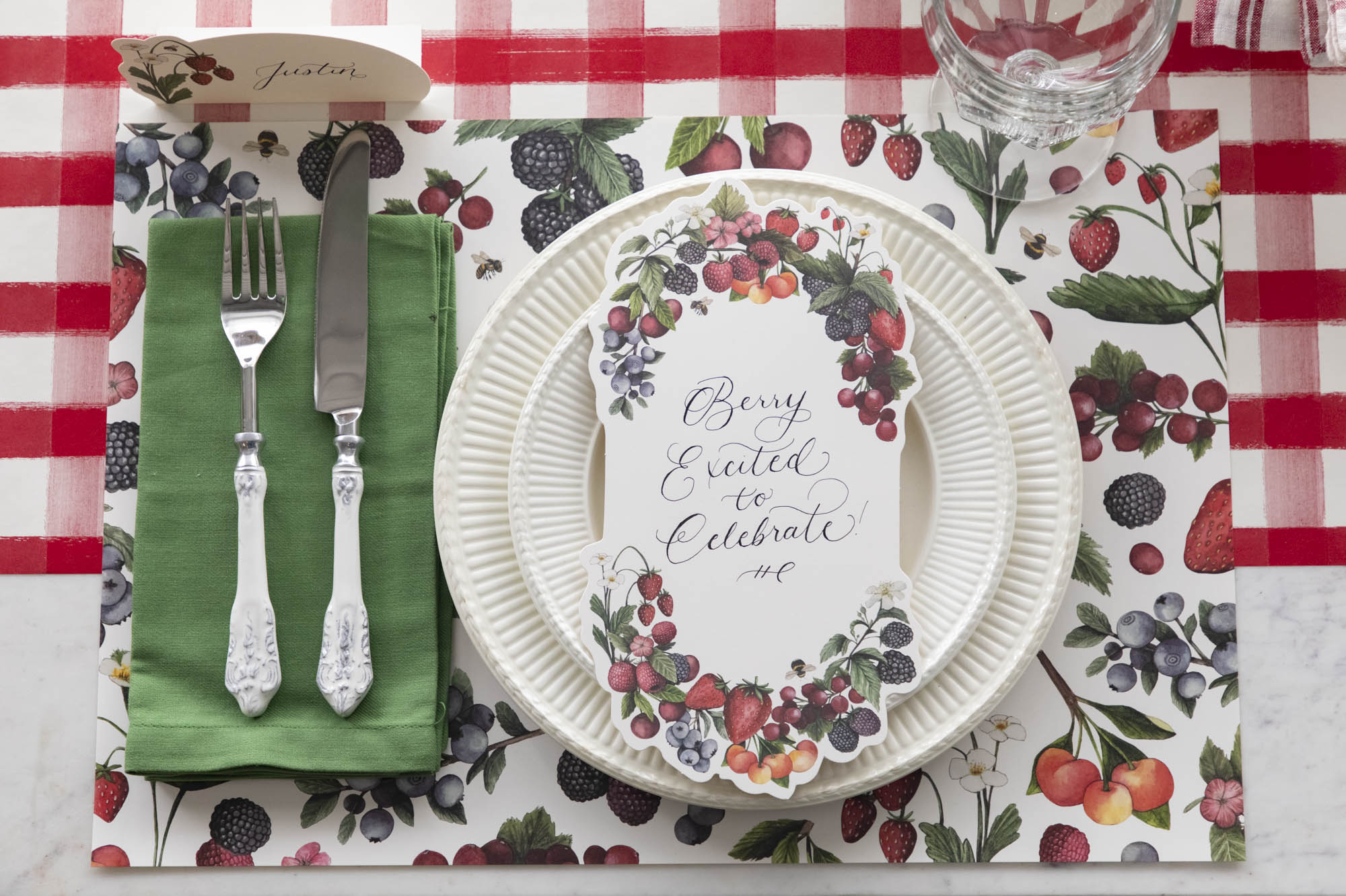 Wild Berry Runner under a table setting featuring assorted fruit.