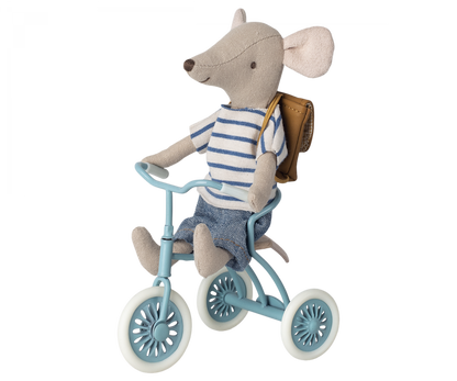 Stuffed Maileg mouse on a Abri à tricycle greeting another mouse on a bench with a picnic setup.