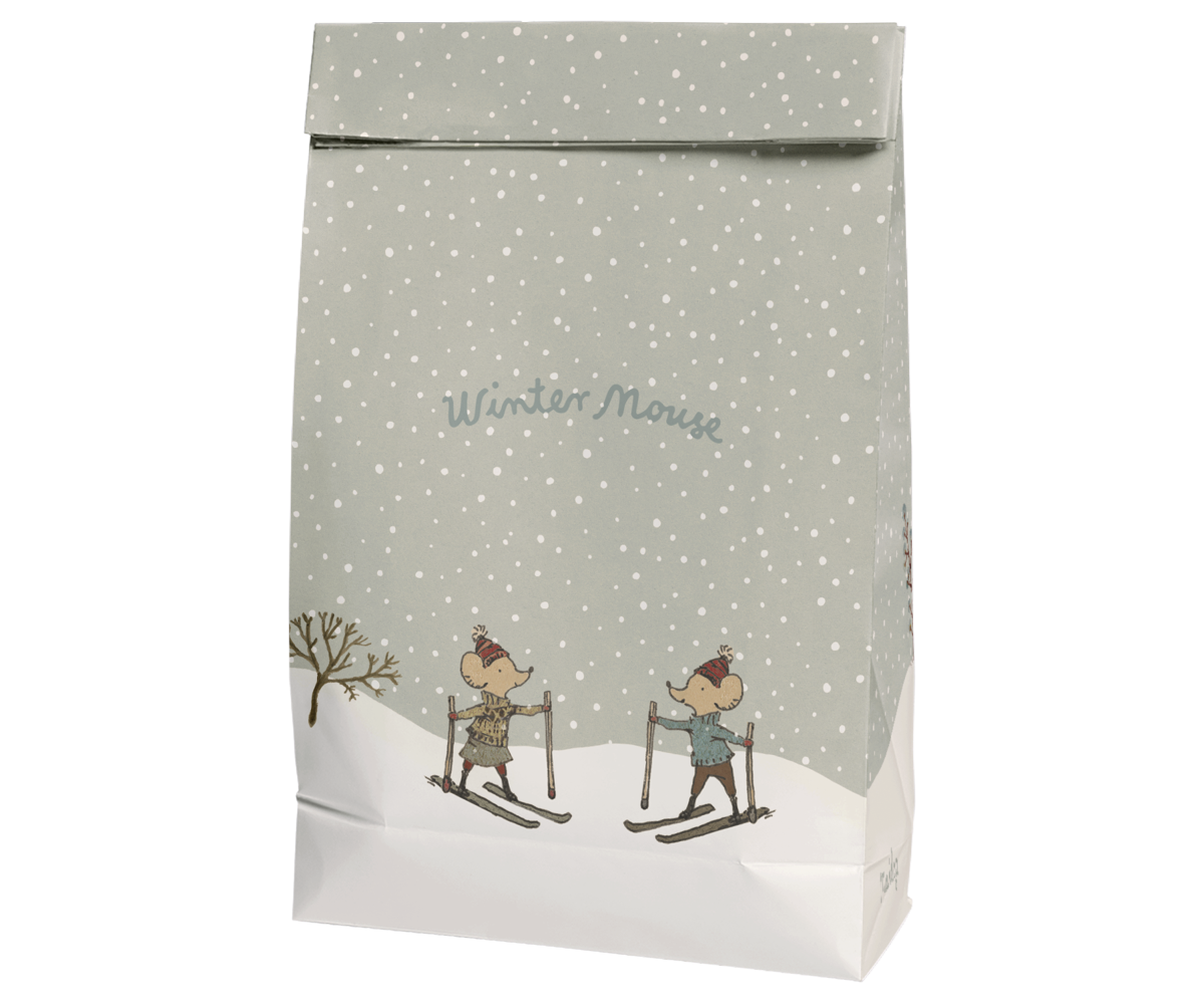 Paper gift bag with 2 mice on skis printed on it.