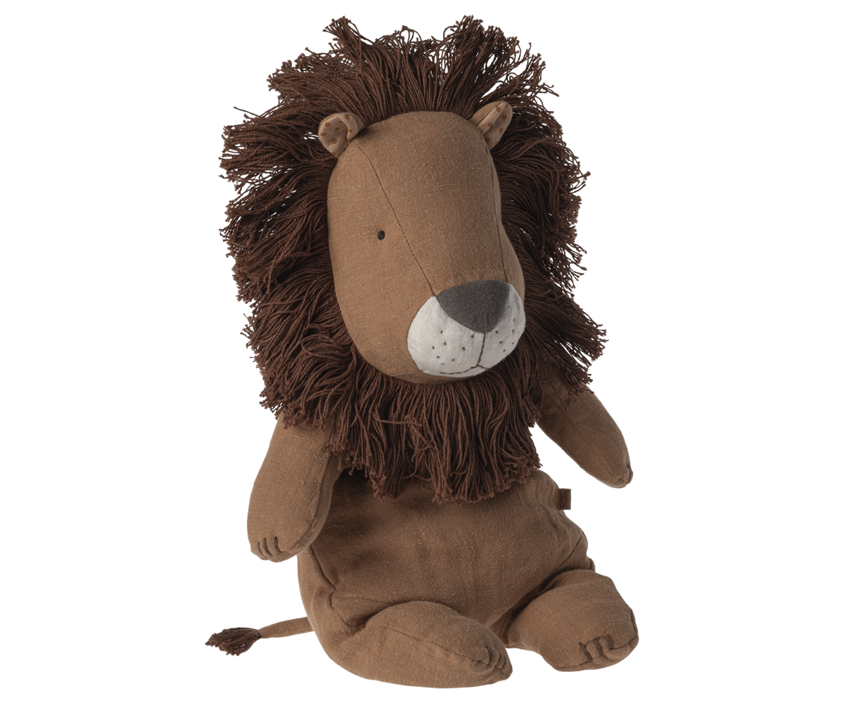 Stuffed animal in the shape of a lion sitting