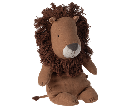 Stuffed animal in the shape of a lion sitting