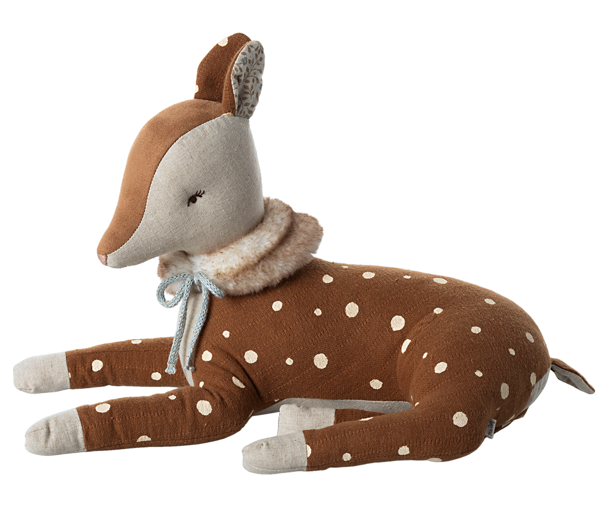 Stuffed animal brown deer with white spots and a faux fur scarf tied with a off mint bow