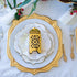 A stunning Christmas table setting adorned with gold and pomegranate accents, featuring elegant Eid Creations White Scalloped Plates with Gold Rim.