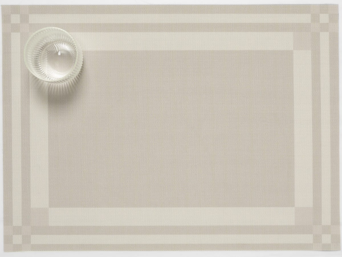 Flax color Handkerchief Compact Rectangle Placemat with a glass in the corner. 