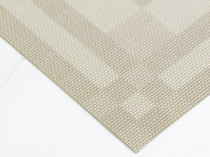 Close up of the corner of the Flax color Handkerchief Compact Rectangle Placemat