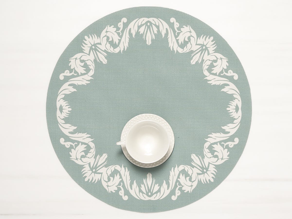 Scroll Round Placemat with teacup on it in Abalone color