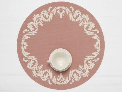 Scroll Round Placemat with teacup on it in Burnt Coral color