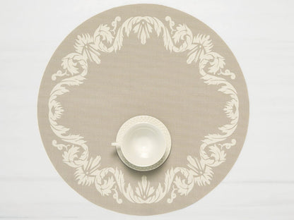 Scroll Round Placemat with teacup on it in Flax color