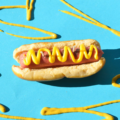 Hot dog shaped candle by Glow Worm Goods.