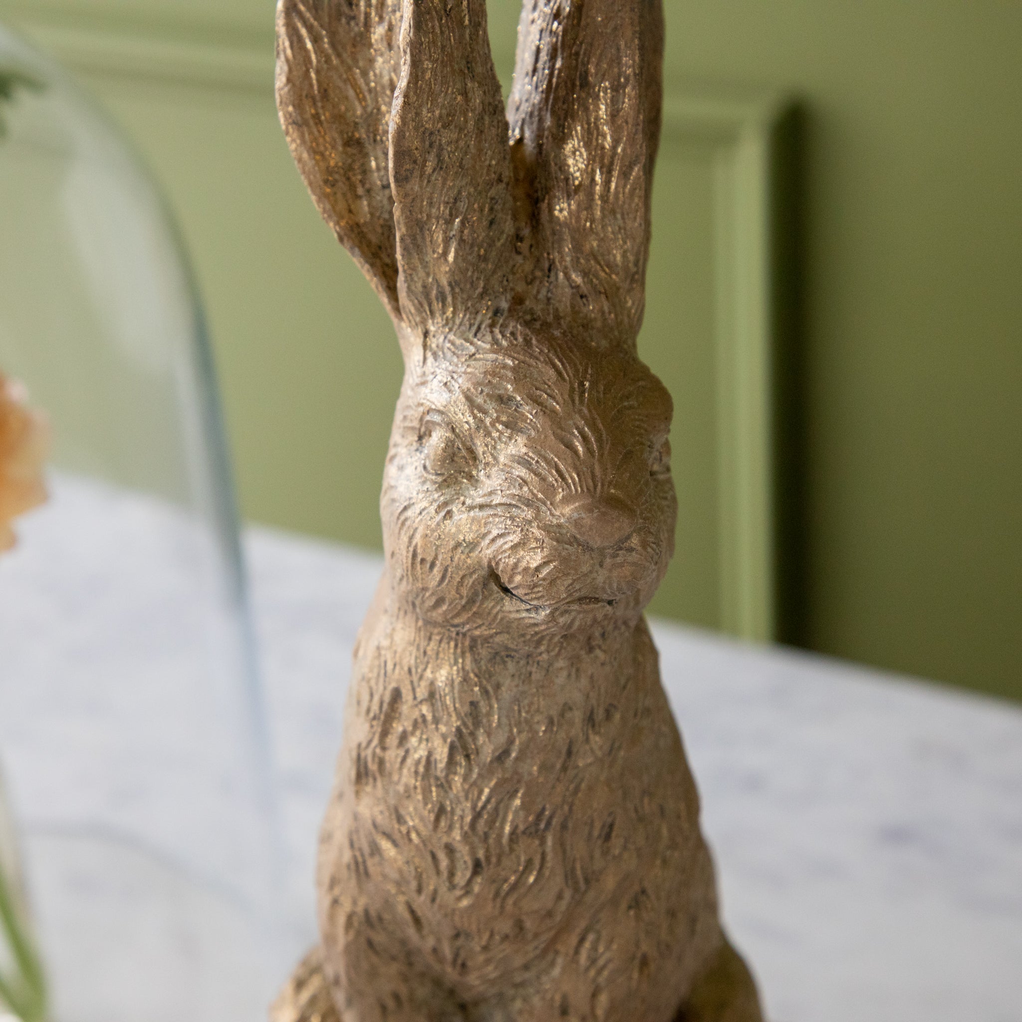 A close up of the Head Down Gold Leaf Rabbit showing the details.