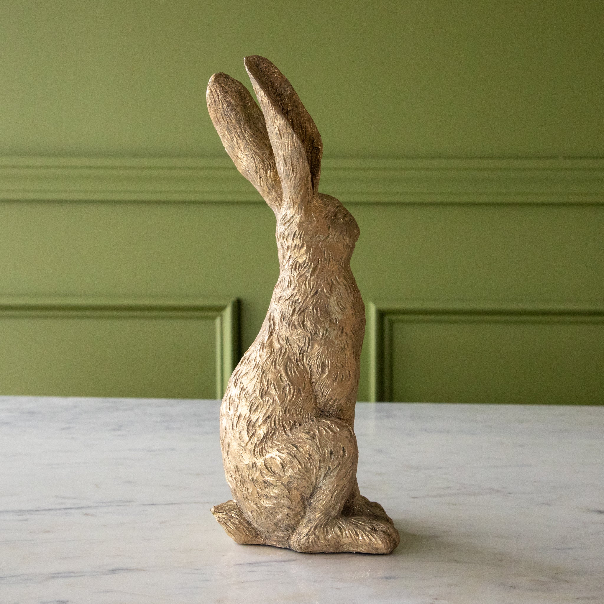 Side view of the Head Up Gold Leaf Rabbit.