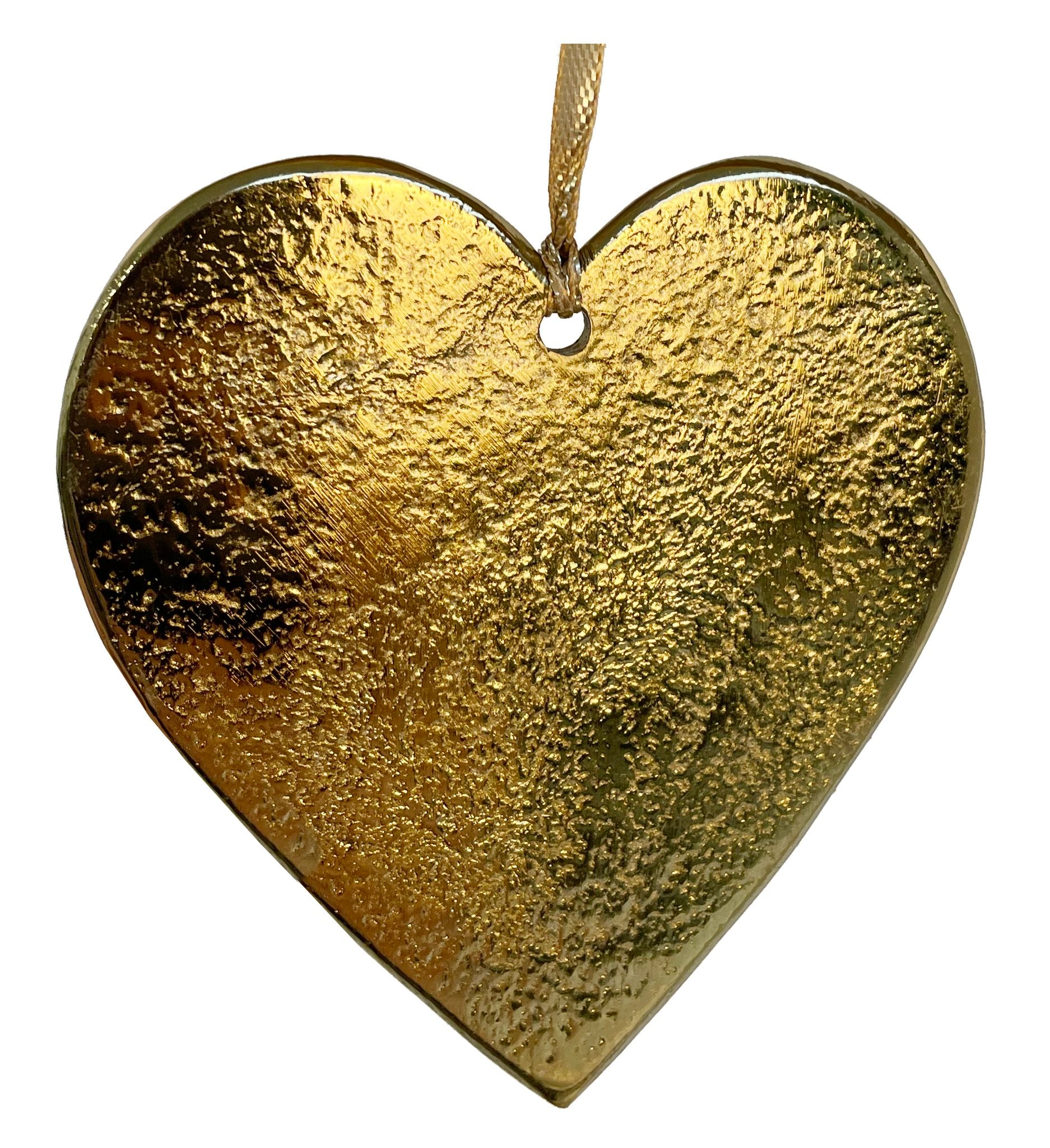 Close up of the gold metal heart ornament