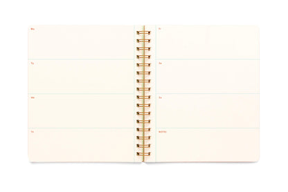 The inside of the Undated Letter Press Planner showing a blank weekly calendar across both pages.