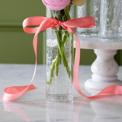 Norwell Champagne Flute filled with flowers and a pink bow tied around it.