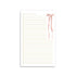 Lined notepad with an illustrated pink bow in the top right corner that says "Make a list, darling" at the top. 