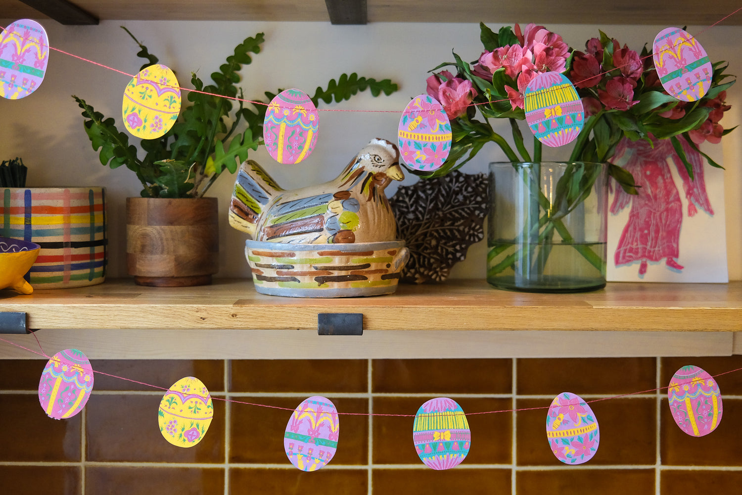 Easter Egg Garland hanging by East End Press. 