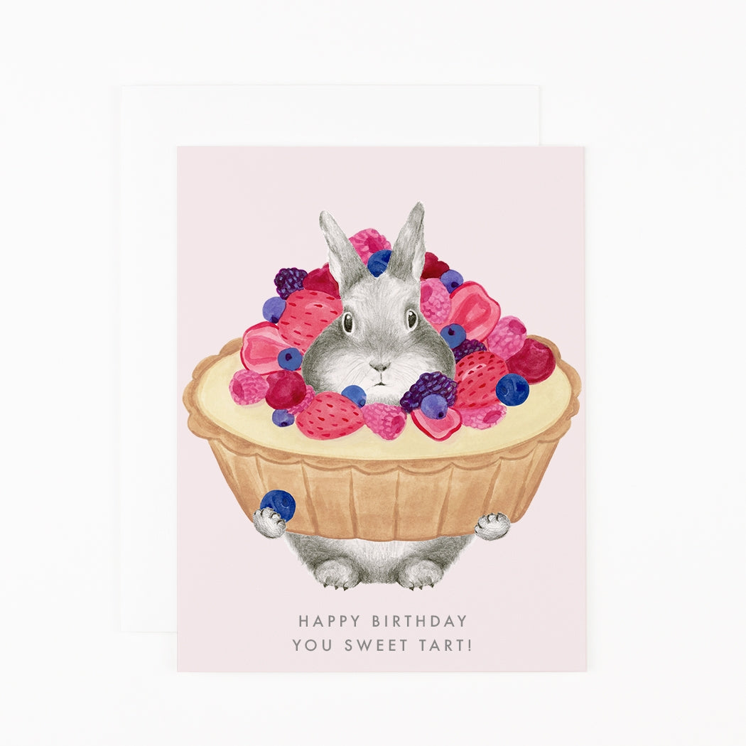 Greeting card by Dear Hancock with an illustration of a bunny in a pie covered in berries with &quot;Happy Birthday You Sweet Tart&quot; printed below. 