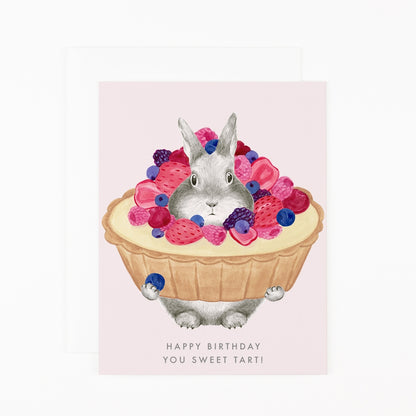 Greeting card by Dear Hancock with an illustration of a bunny in a pie covered in berries with &quot;Happy Birthday You Sweet Tart&quot; printed below. 