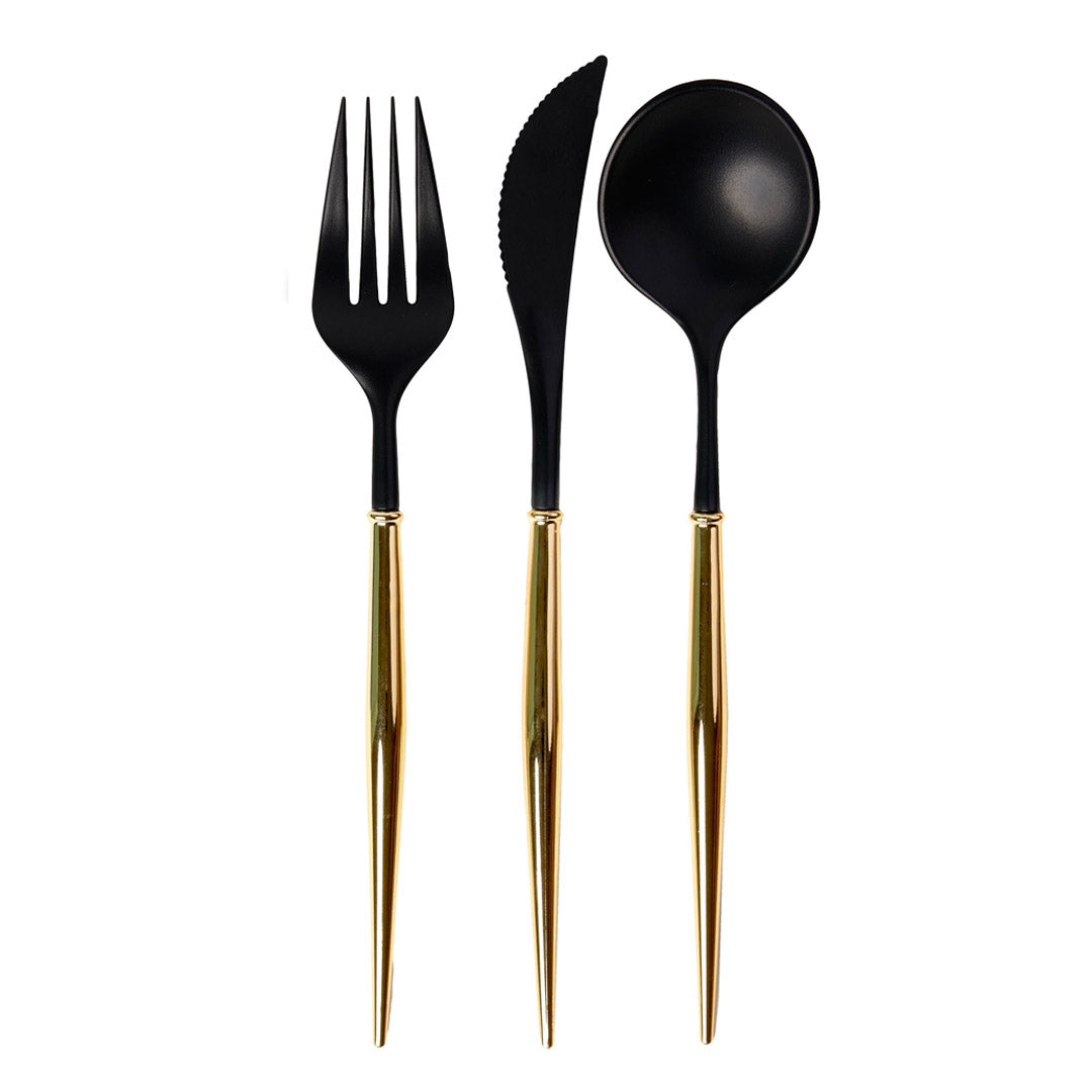 Plastic fork, knife and spoon with gold bottom and black top, on a white background.