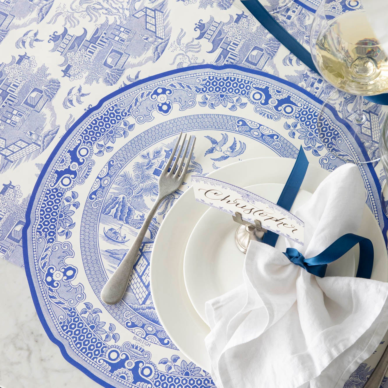 Die-cut Blue Willow Plate Placemat paired with the Blue Willow Runner, elegantly styled for one place setting.