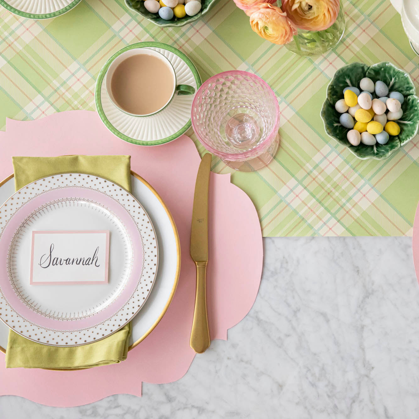 A colorful place setting with the Bright Green Plaid Runner under the Die-cut Pink French Frame Placemat and place setting.