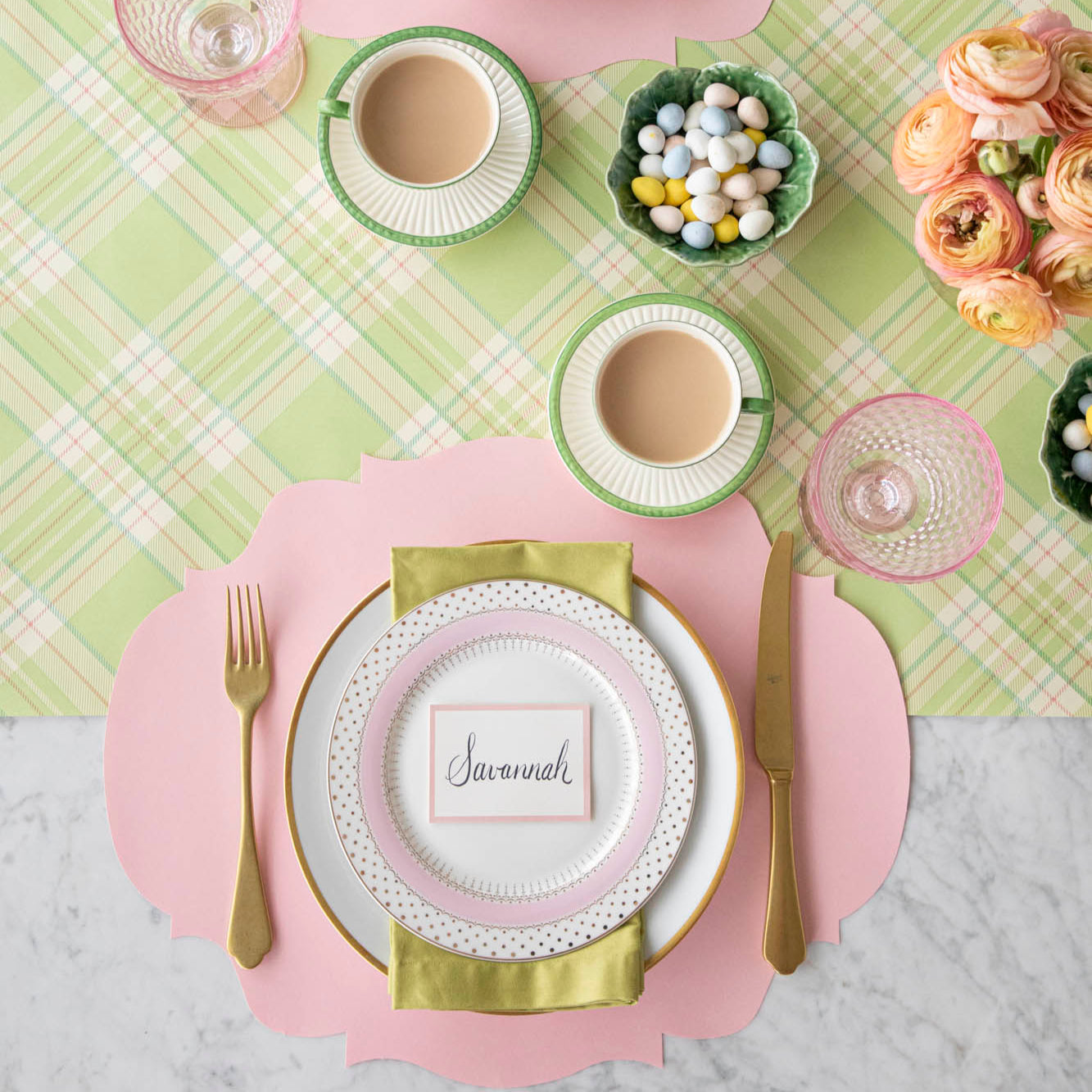 A colorful place setting with the Bright Green Plaid Runner under the Die-cut Pink French Frame Placemat and place setting.