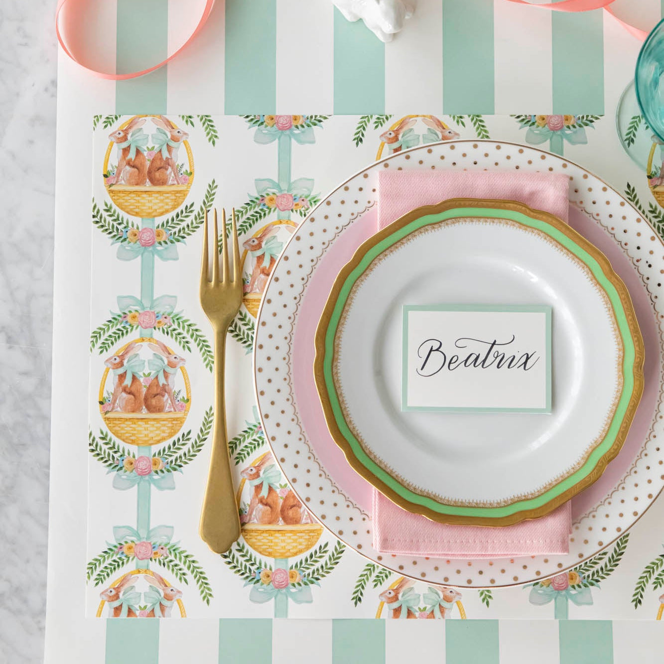 Laurel Bunny Baskets Placemat under a spring themed place setting.