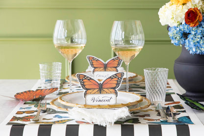 A variety of colorful butterflies displayed against a light background on Hester &amp; Cook&