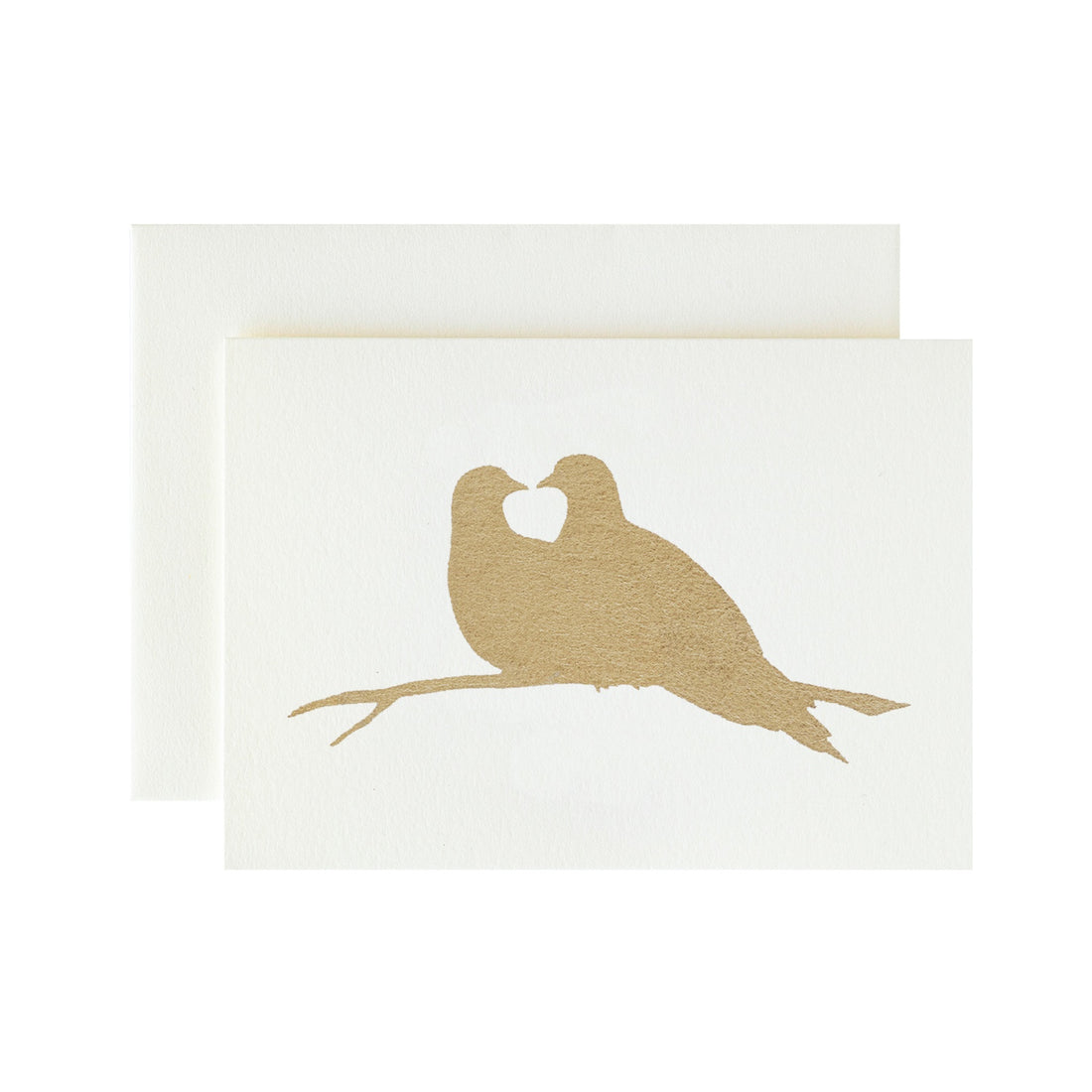 A white card with the silhouette of a pair of doves on a branch in solid gold leaf.