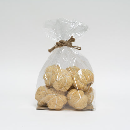 cream coco fiber pumpkins in cellophane bag