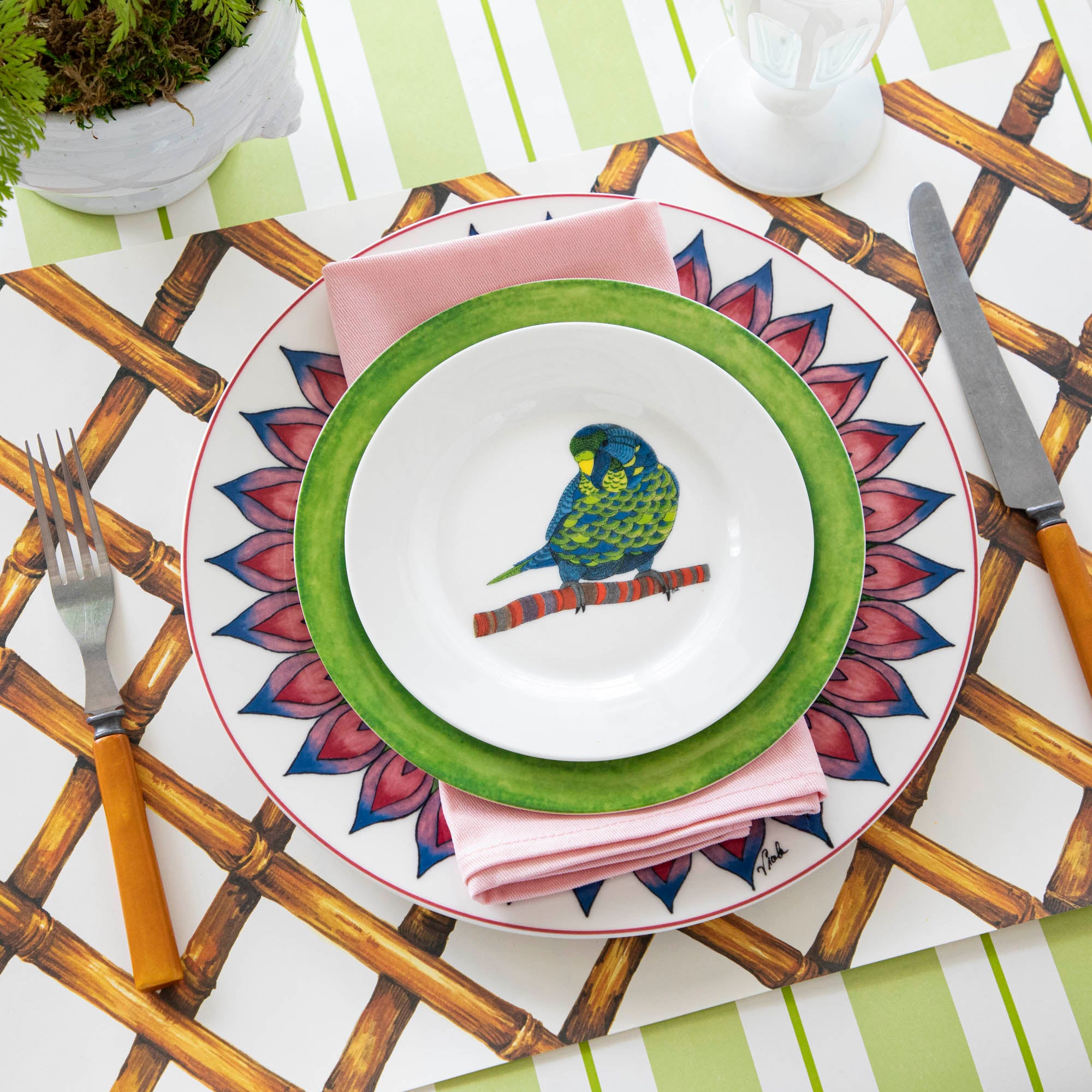 A plate with a bird on it from the Park Hill Calypso Dinnerware collection.