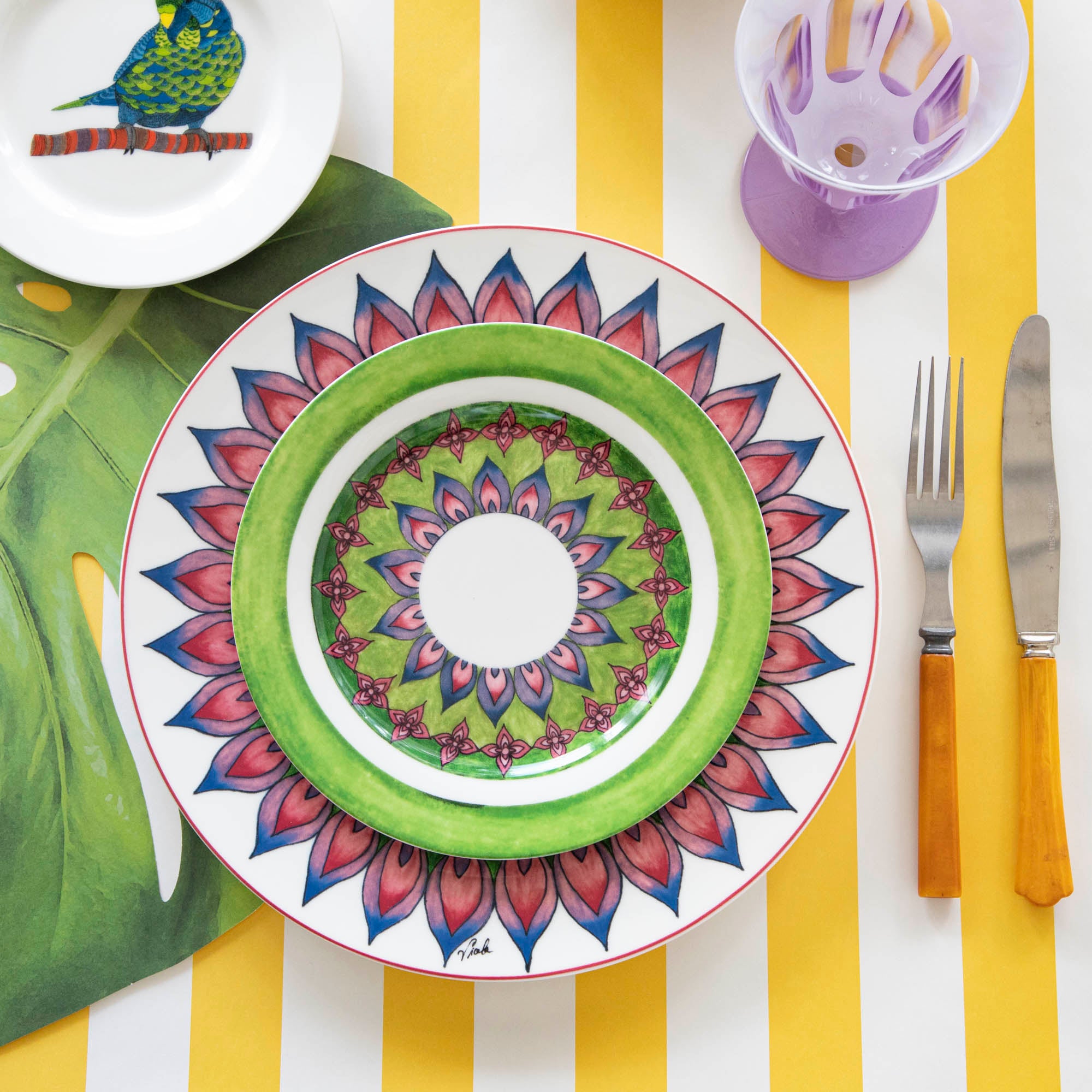 A plate with a bird on it from the Park Hill Calypso Dinnerware collection.