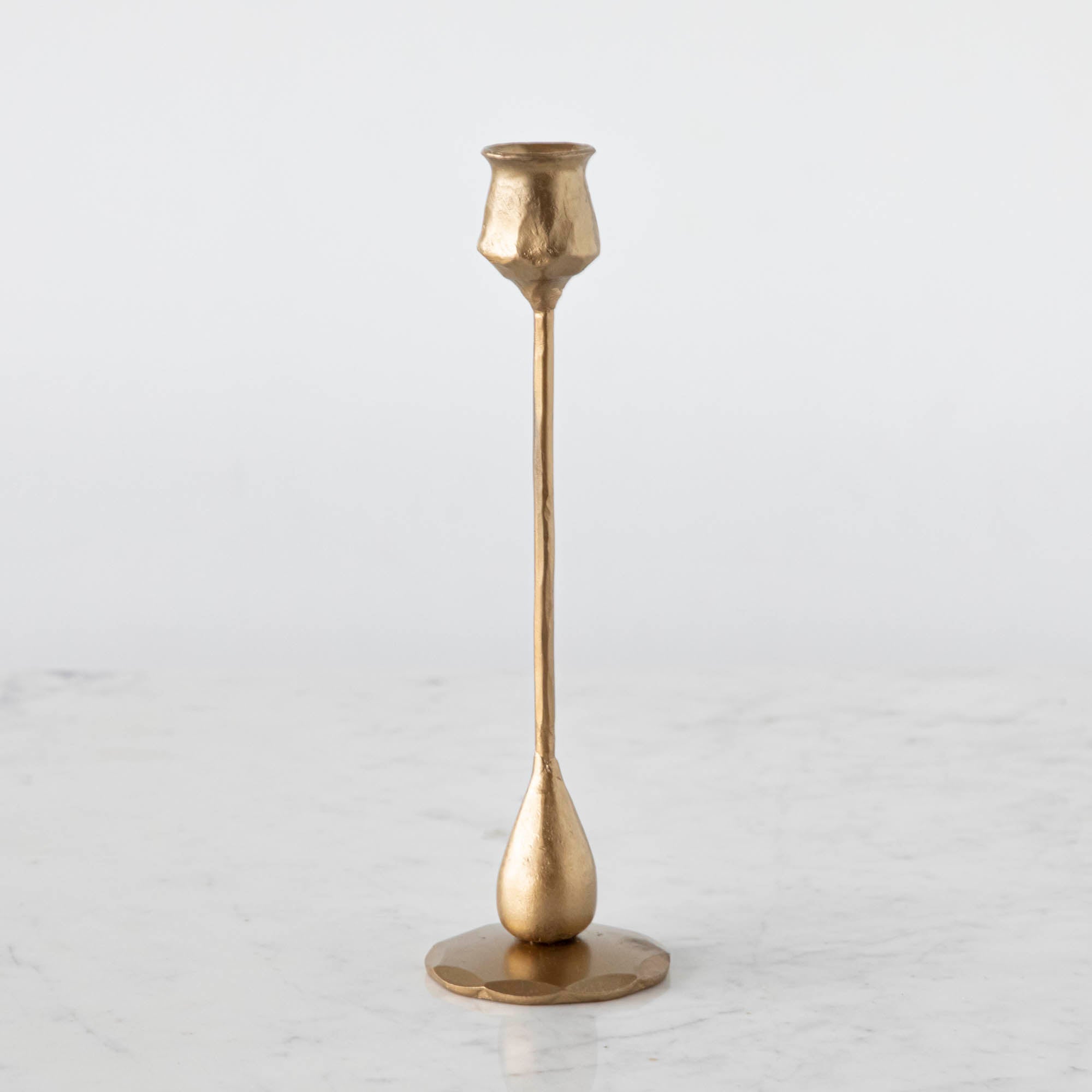 Tall Tulip Hand-Forged Iron Taper Holder with an Antique Brass Finish. 