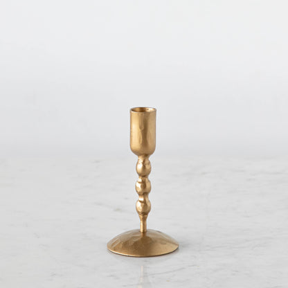 Short gold twisted gold candle holder. 