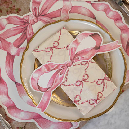 An elegant place setting with the Pink Bow Table Accent on the Pink Bow Guest Napkin, centered on the plates.