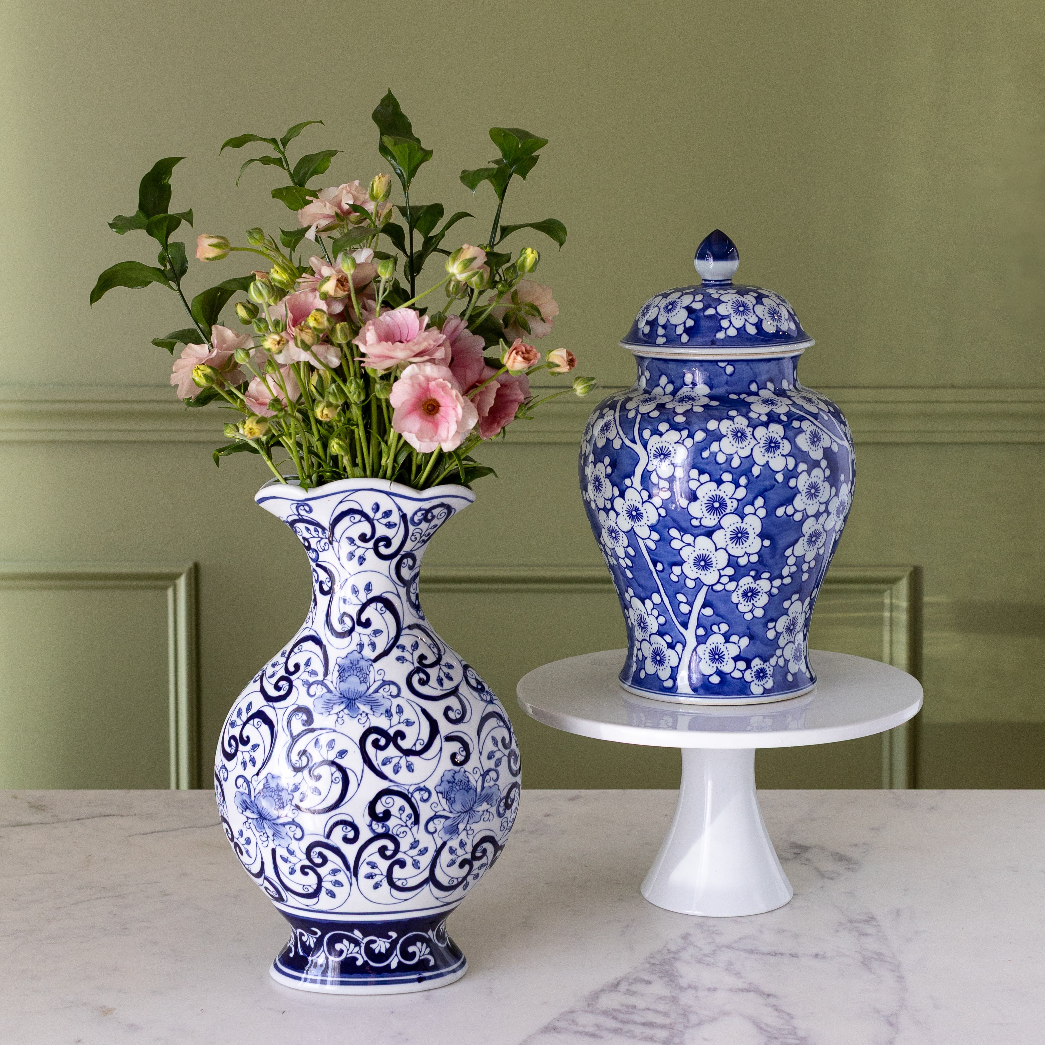 Imperial Ceramic Floral Ginger Jar and Chinoiserie Classic Vase with flowers in it on a table.