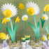 Daffodil Honeycomb styled on a daffodil themed table setting and hanging above it.