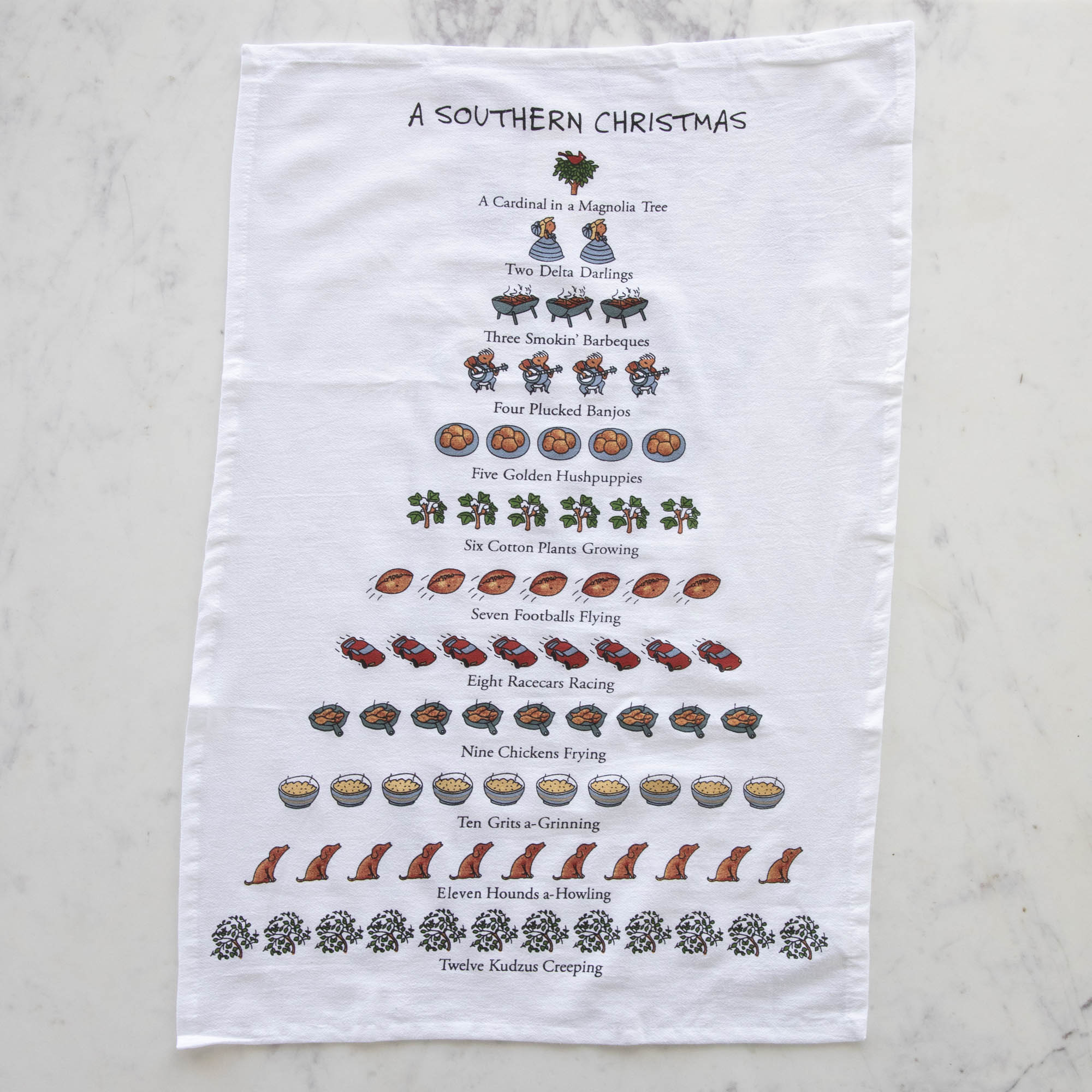 A Southern Christmas Print Kitchen Towel featuring the Twelve Days of Christmas in southern theme.