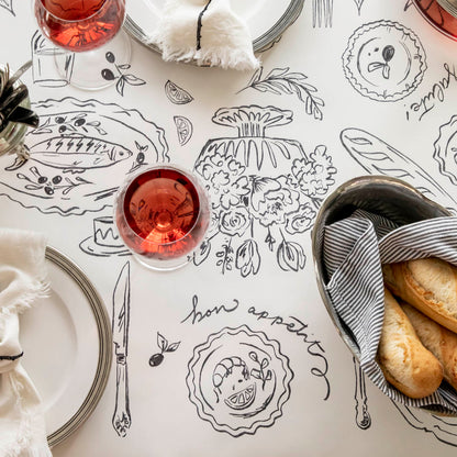 The Dinner Party Runner under an elegant table setting.