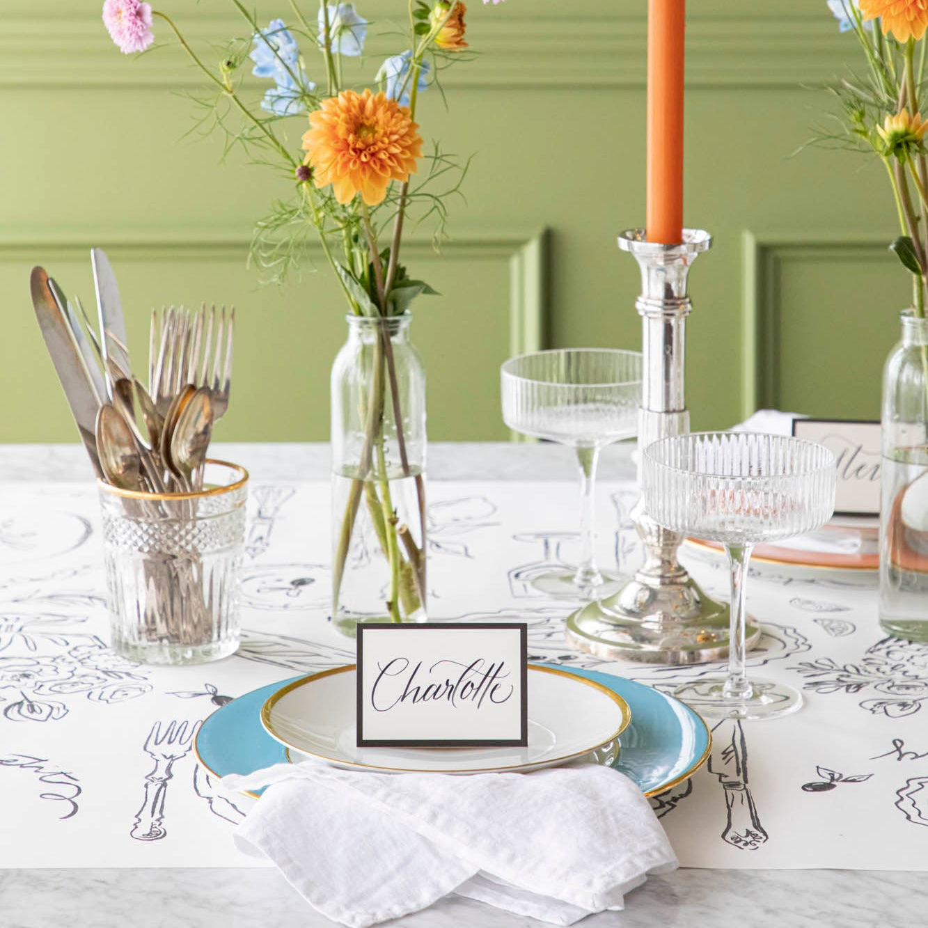 The Dinner Party Runner on a colorful table setting.