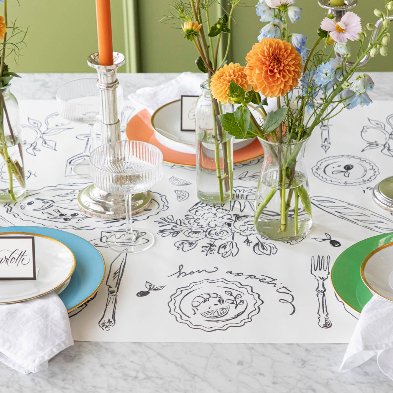 The Dinner Party Runner under a colorful table setting.