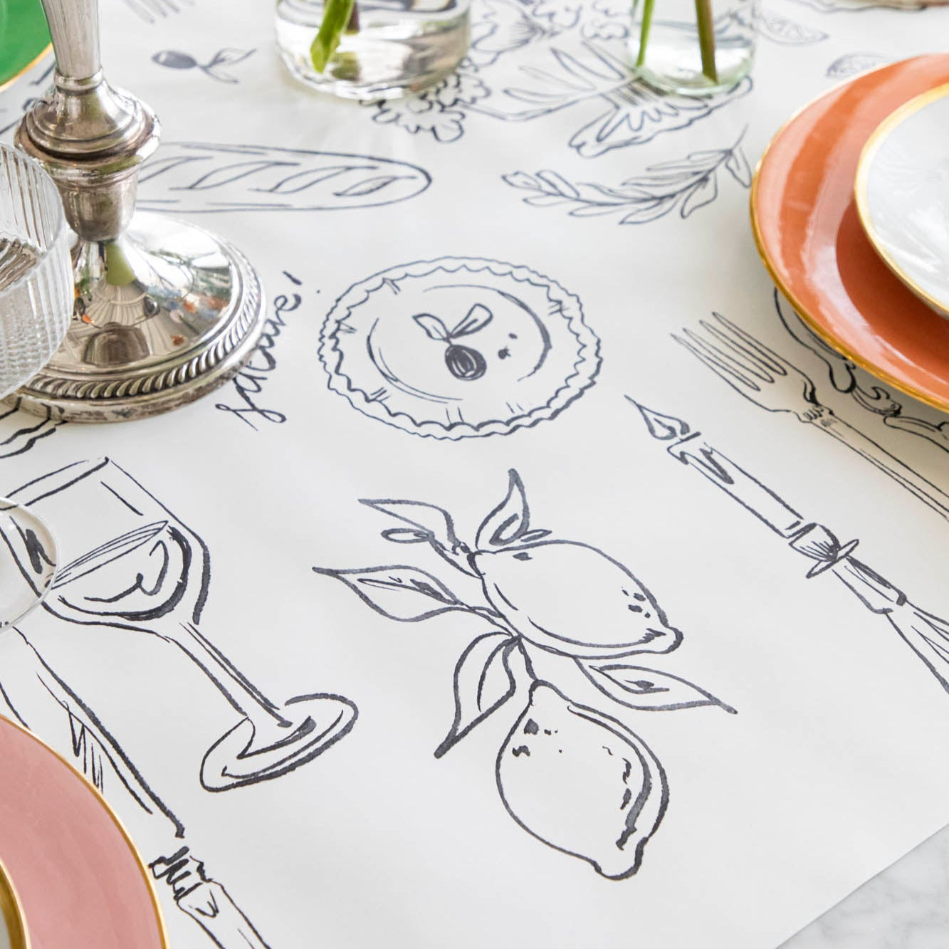 The Dinner Party Runner under a colorful table setting.