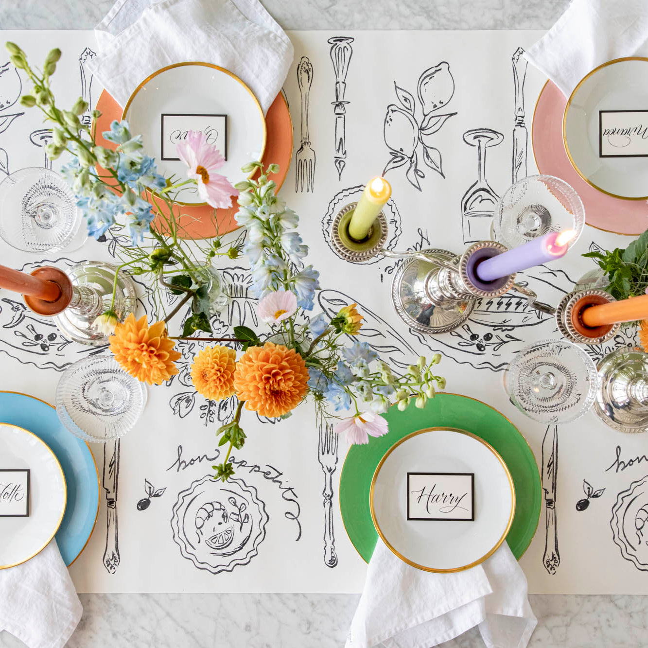 A colorful table setting with the Dinner Party Runner underneath.