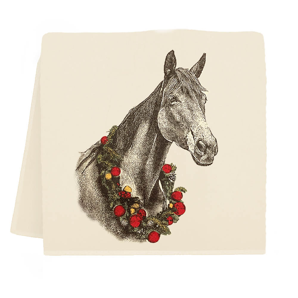 Tea towel with image of a horse with a wreath around its neck that has red ornaments in it. 