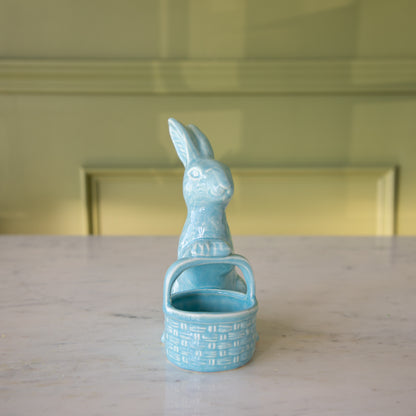 Front view of the Blue Ceramic Embossed Bunny Holding Basket in front.