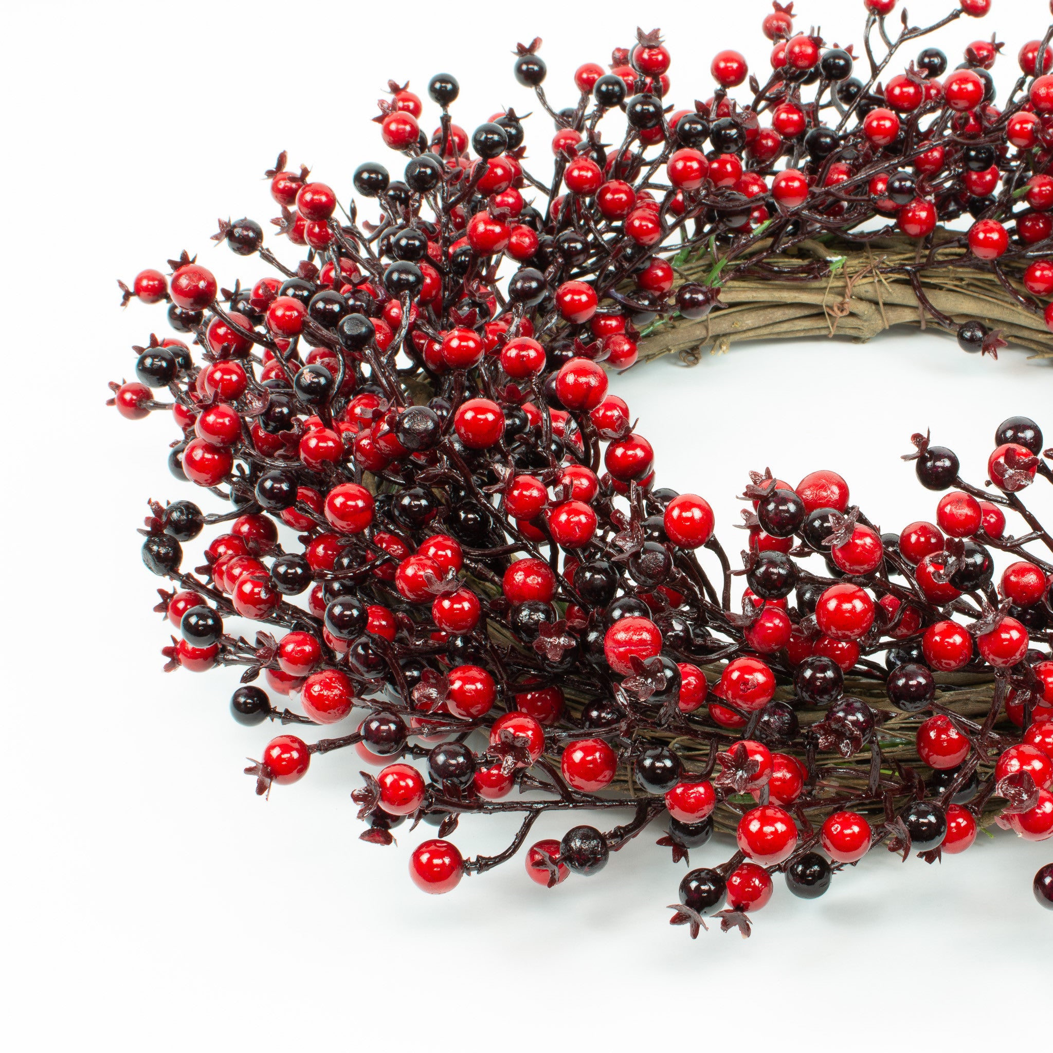 Close up of red berry wreath