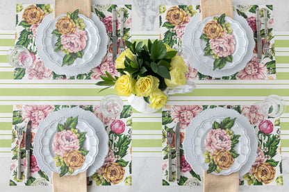 The Garden Cascade Placemat under an elegant table setting for four, from above.