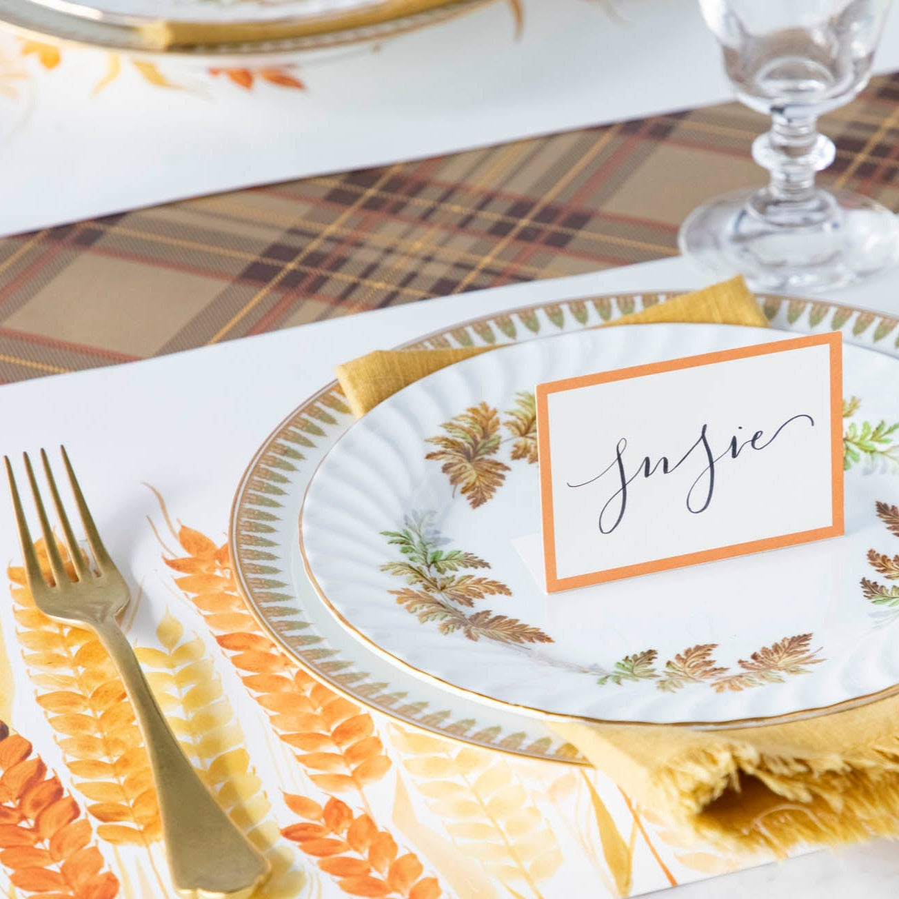 Close-up of the Golden Wheat Placemat under a fall themed place setting.